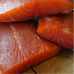 close up of cold smoked salmon chunks pre sliced