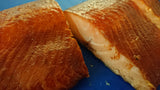 close up of hot smoked salmon fillet cut in half